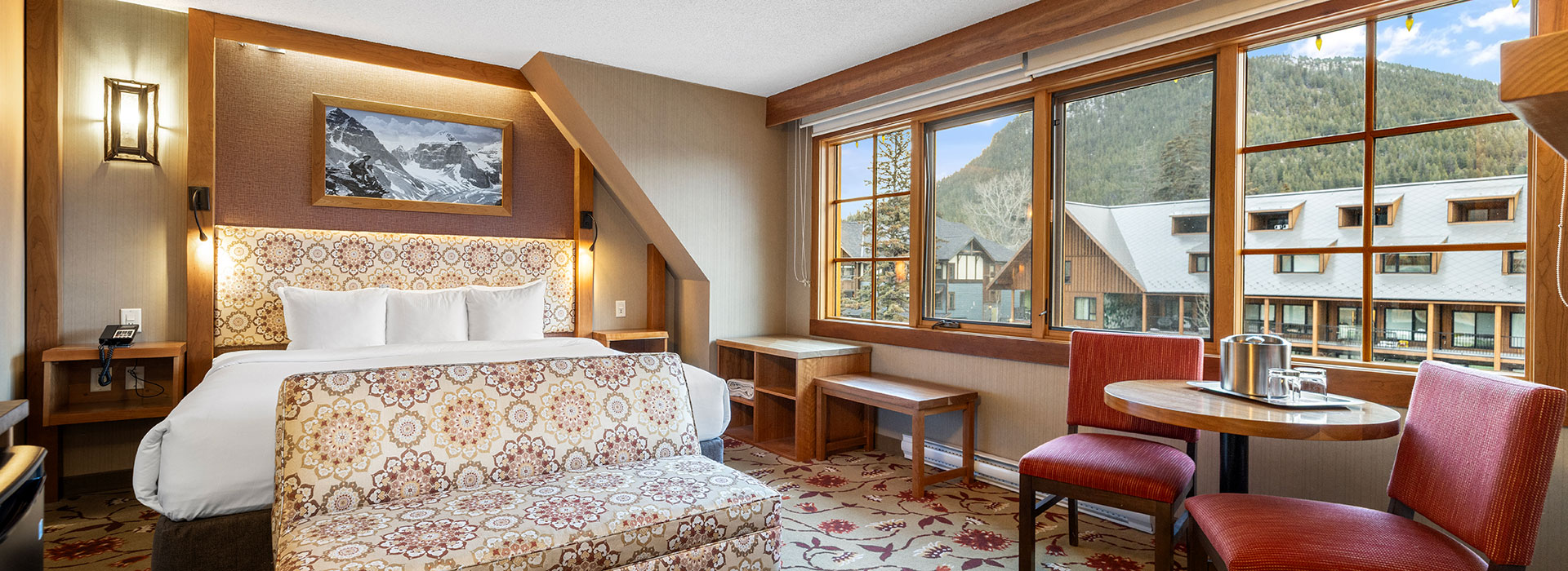 Mountain view king suite with large windows